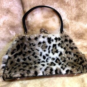 Fun Faux fur pocketbook. Plush and elegant. Like new.